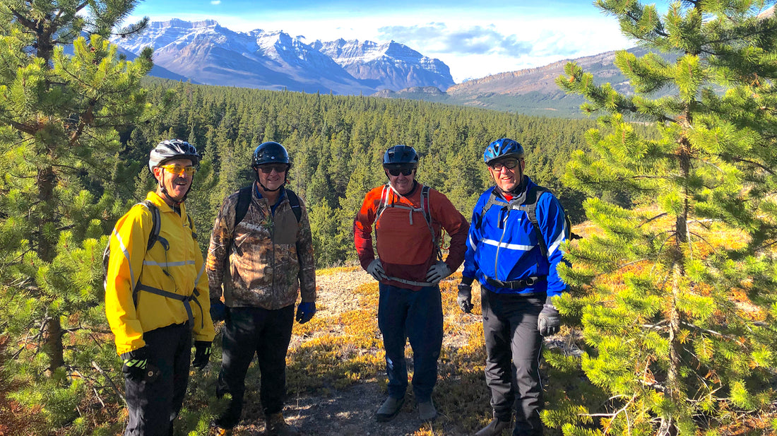 Four Men Outside in Rocky Mountains